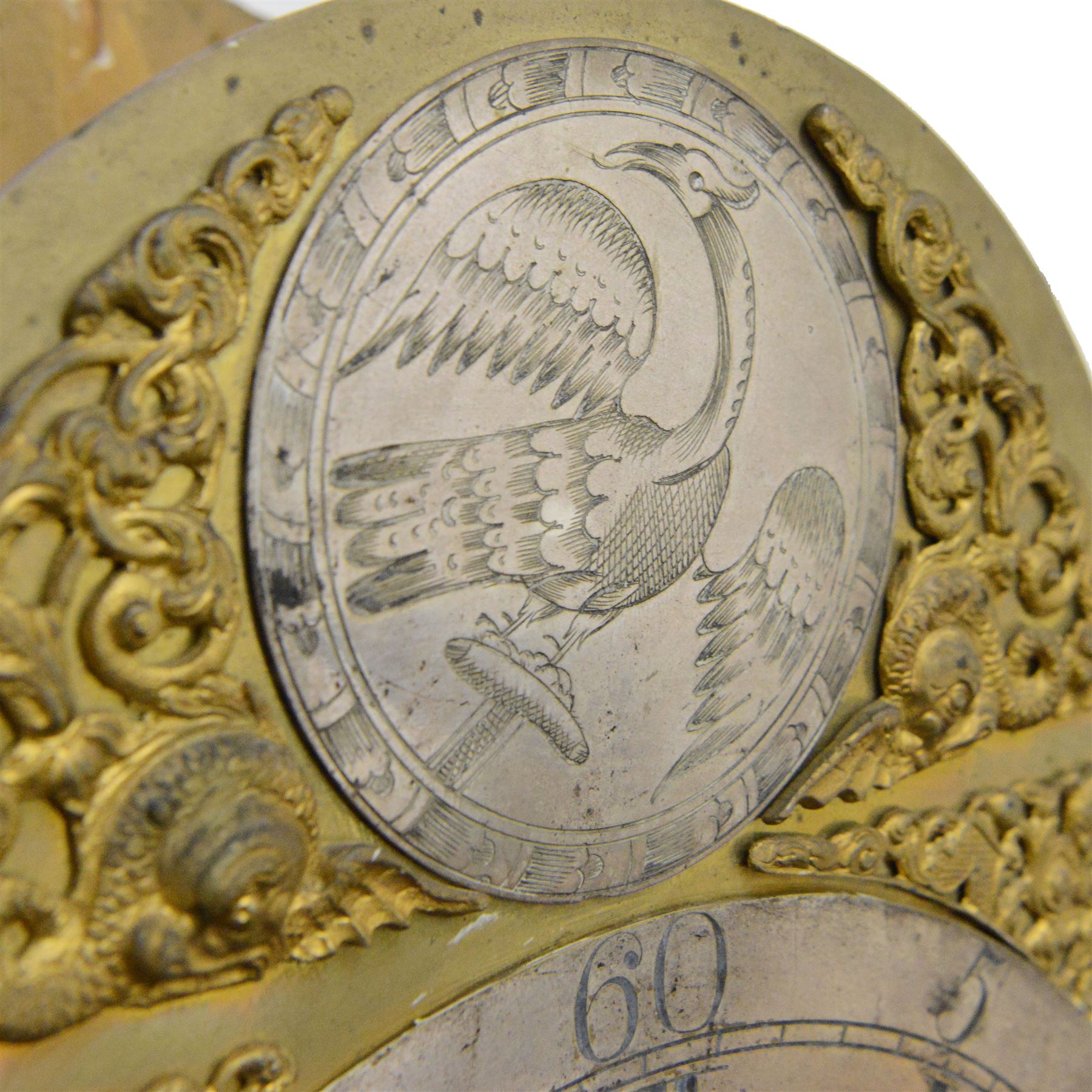 William Hayler of Chatham (Kent) - Fine George III black japanned chinoiserie decorated longcase clock c1760,  hood with a break arch top, glazed side panels and three matching wooden finials, conforming hood door beneath with attached pilasters, long trunk with a  break arch door and moulded surround, on a square double stepped plinth with a flat base, case and hood profusely decorated with scenes of gilt pagodas, temples, birds, people and panels of floral decoration, brass dial with cast brass spandrels and a silvered boss to the arch, silvered chapter with Roman numerals, minute track and five minute Arabic's, matted dial centre with seconds dial, date aperture, matching steel hands and silvered cartouche with makers name, dial pinned directly to a five-pillar rack striking movement with a recoil anchor escapement. With  pendulum, weights  and key.
William Hayler is recorded as working in High Street, Chatham, from 1750-1810, possibly two makers (father & son) working in succession.

