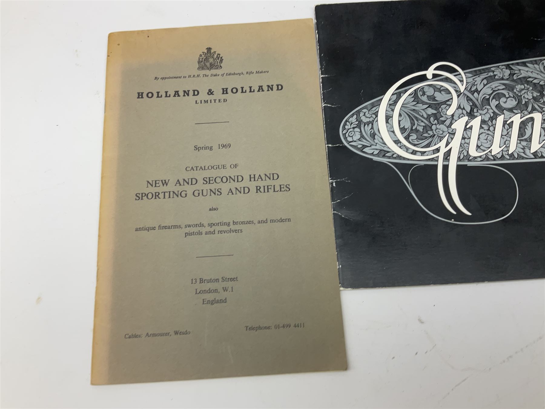 Sixteen books/booklets on guns and shooting including 1969 Holland & Holland Catalogue; two Gunmark Guides to Good Shooting; Shooters Bible 1972 etc; and small quantity of militaria books