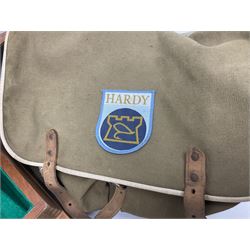 Four Abu fishing reels, comprising Ambassadeur 9000, Ambassadeur 7000, Ambassadeur 5500 and Ambassadeur 6500, together with additional line, hardy fishing bag and two wooden boxes