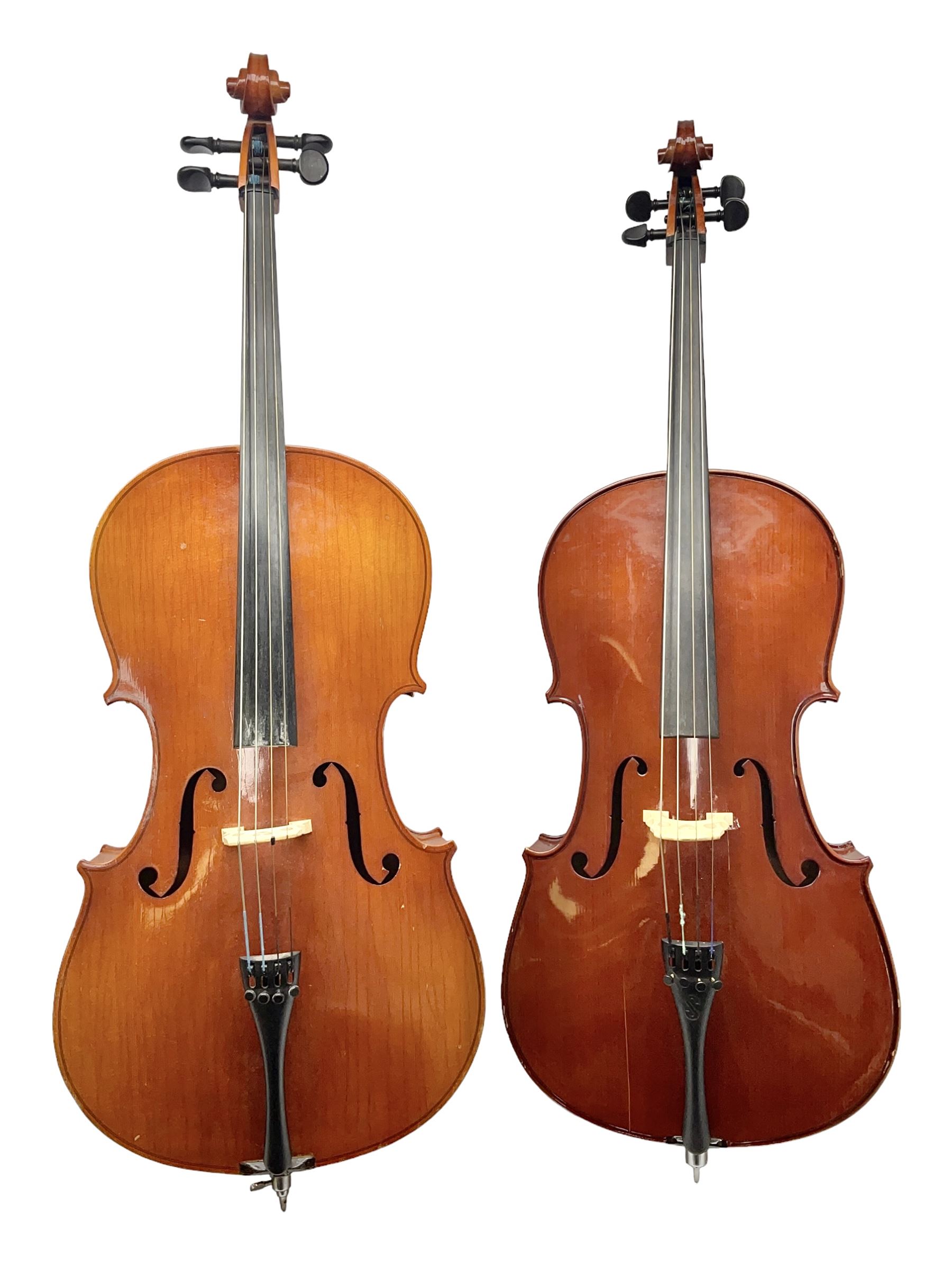 Modern Hungarian half-size cello with 69cm two-piece maple back and ribs and spruce top L114cm overall; and Stentor half size cello bearing label 'The Stentor Student II'; each in soft carrying case (2)