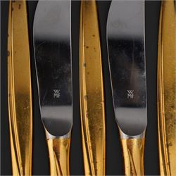 Extensive suite of WMF 800 silver gilt cutlery, for twelve covers, comprising twelve table knives and forks, fish knives and forks, dessert forks, table spoons, dessert spoons, teaspoons, eleven dessert forks and six serving spoons, with crescent moon and crown WMF hallmarks