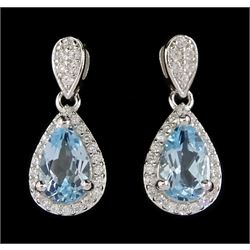 Pair of silver blue topaz and cubic zirconia pendant stud earrings, stamped 925