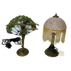  Art Deco Tiffany style table lamp, modelled as a dancer with a fan shaped shade, together with another table lamp with mottled glass and tassel shade, tallest H41cm