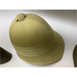 Early 20th century British army peaked cap with Scots Guards brass badge; another later with Scots Guards Staybrite badge; modern pith helmet; British army water bottle with later webbing cover; pair of Carl Zeiss blc 7 x 50 binoculars; and Dunn & Co bowler hat