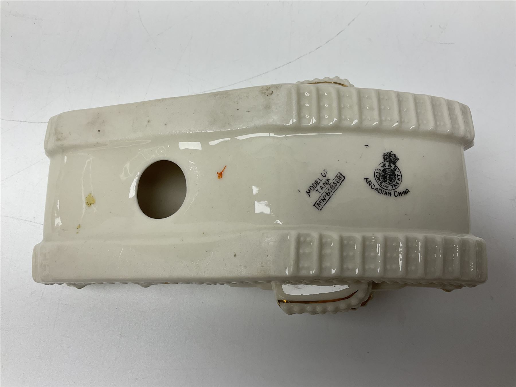 Ten WW1 crested china military models of tanks and field guns; various makers including Goss, Grafton China, Arcadian China, Savoy China etc; various crests including Portsmouth, Brighton, Pendleton, Paignton, Cowes, Flamborough etc (10)