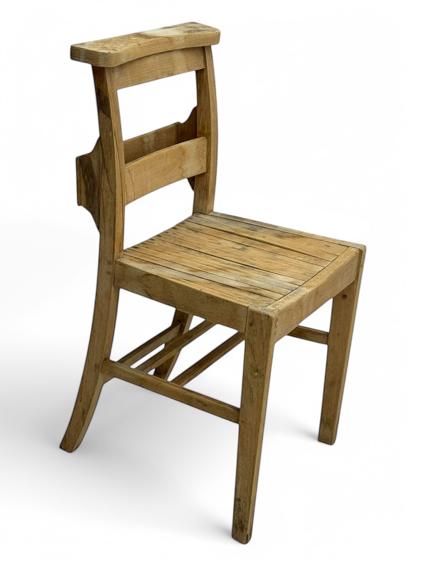 Late 20th century ladder-back chair with recessed Bible storage; pair of spindle back farmhouse chairs; cross-back bistro chair with an arched top rail and woven rattan seat; ladder-back chair with a Union Jack upholstered seat (5)
