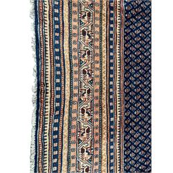 Persian Araak indigo ground carpet, the field decorated with small repeating Boteh motifs, multiple band border decorated with geometric design 