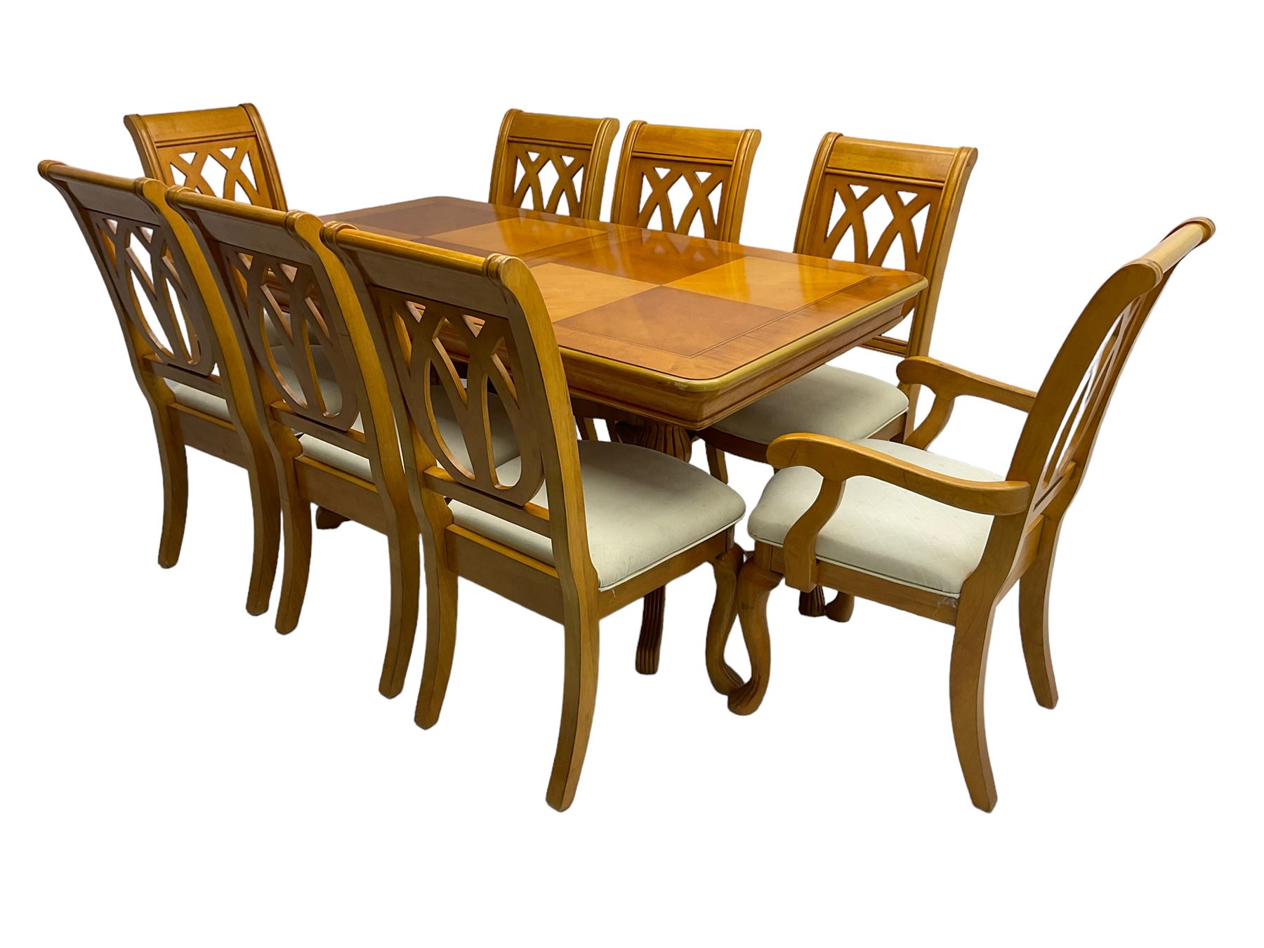 Yew wood extending twin pedestal dining table, rectangular top with ebony stringing over turned and reeded vasiform pedestals on tripod bases, with two additional leaves (W159cm D92cm); and set of eight (6+2) matching dining chairs, high pierced backs over seats upholstered in ivory fabric, on cabriole supports (W57cm H101cm)