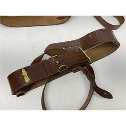 British Army General Staff officer's peaked cap by Herbert Johnson London in Moss Bros. delivery box; two officer's Sam Browne leather belts; leather pistol holster and sword hanger; pair of leather gloves and pair of spurs