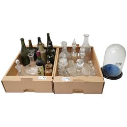 Glass dome shade, various glass decanters and coloured glass bottles