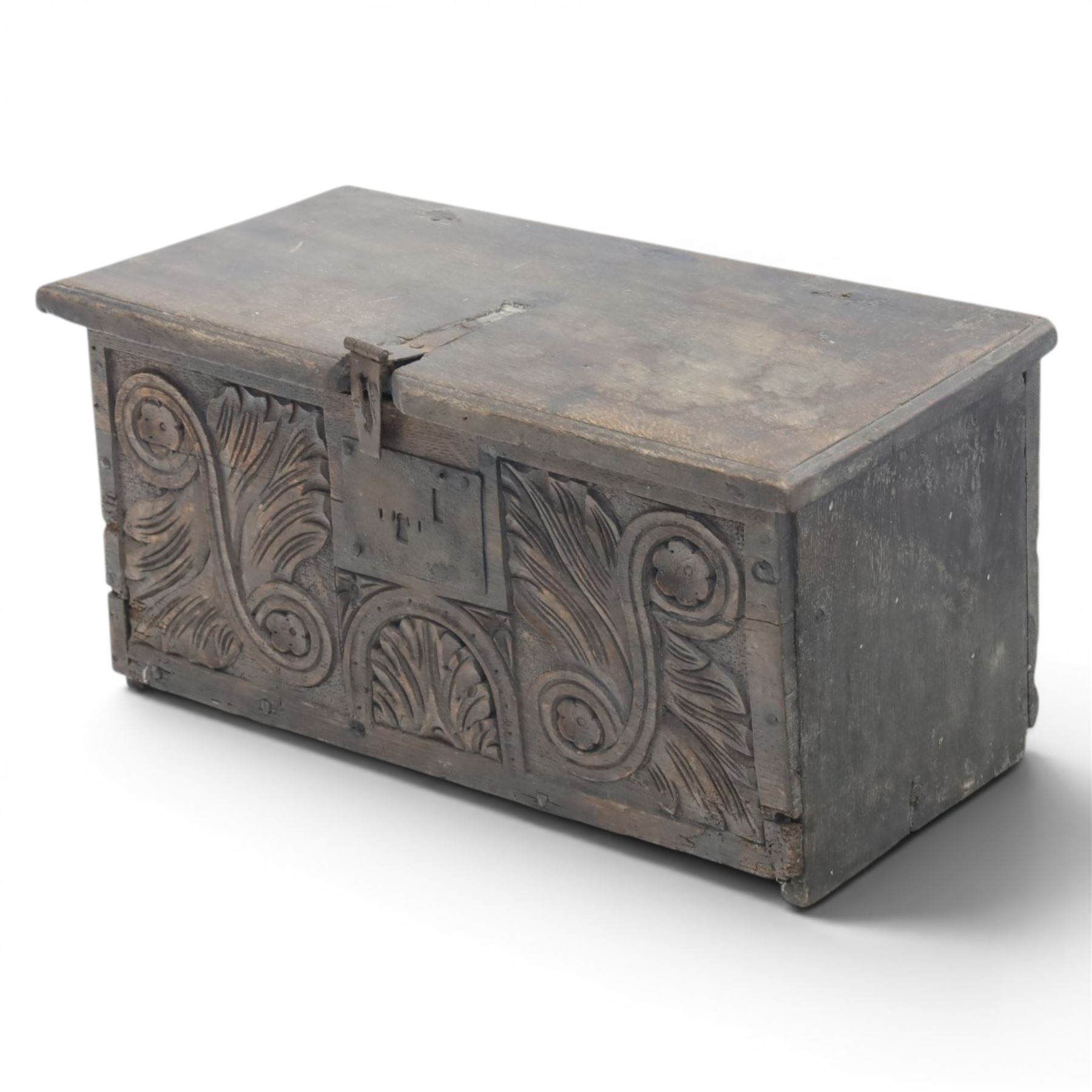 18th century small oak box with carved front, iron strap latch and hinges, fitted candlebox