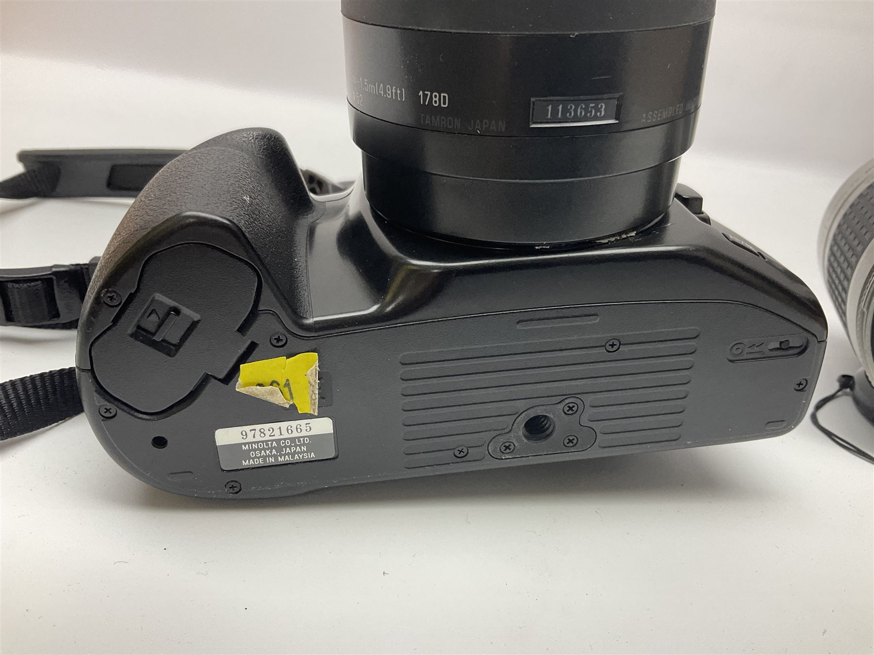 Four Minolta camera bodies, to include Dynax 500si, serial no. 94812651 with 'Signa Zoom 1;3.5-4.5 f=28-70mm' lens, Maxxum 300si, serial no. 97821665, with 'Tamron AF 80-210mm' lens and Dynax 300si, serial no 01603265'  with Minolta AF Power Zoom 35-80mm 1;4' lens, etc, together with Pantax MV1 camera bodies and other camera equipment 