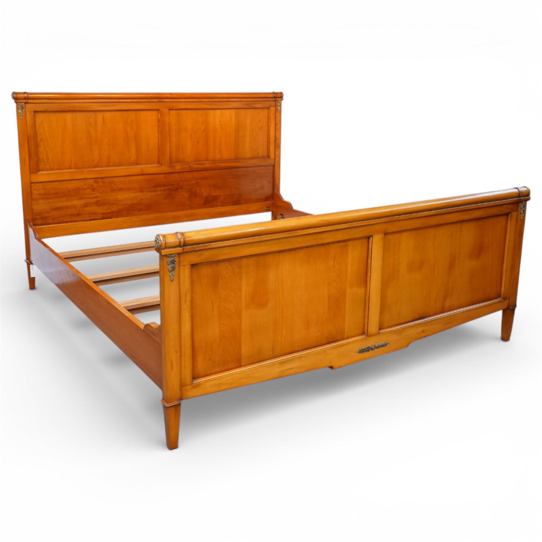 And So To Bed - 6ft super king cherry wood sleigh bed, with turned rails above a panelled head and footboard, with applied brass flowers and foliate mounts, raised on square tapering supports
