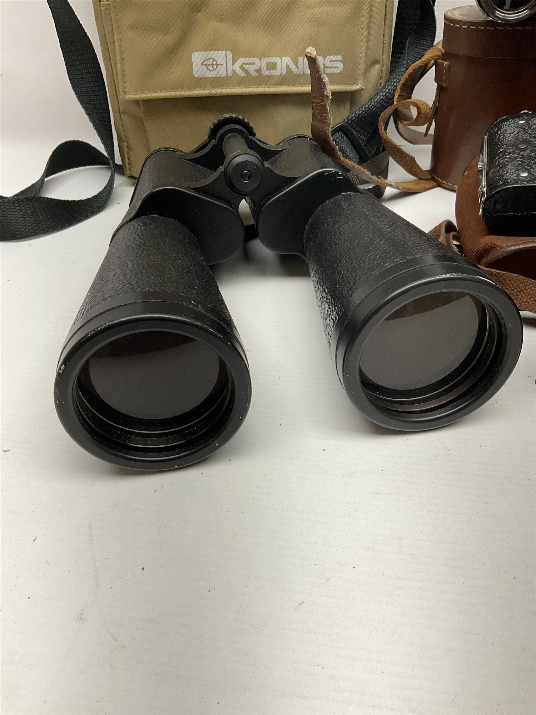  Russian Kronos binoculars 20x60, together with Farina 8x30 binoculars and two cameras, etc