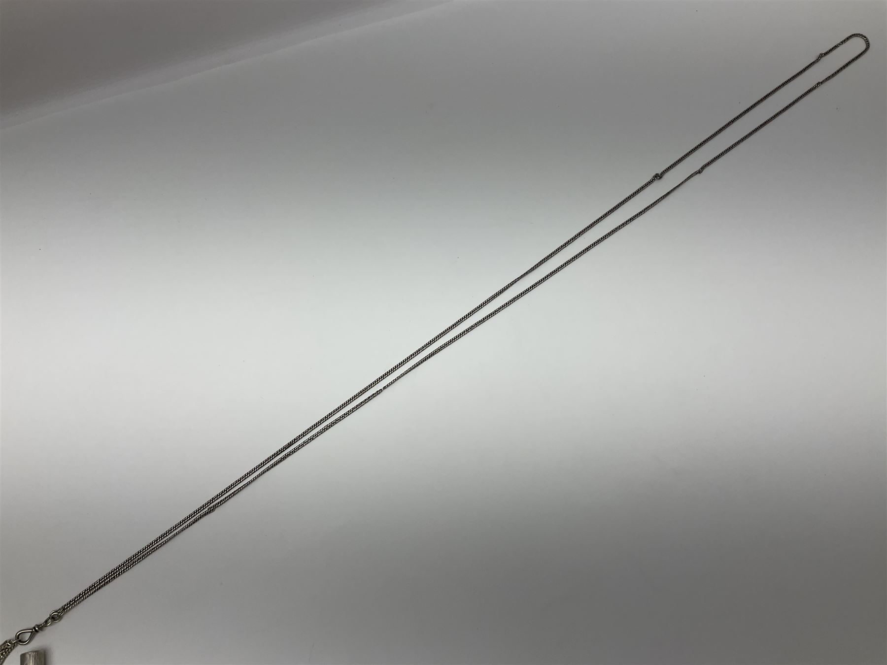 Victorian style silver chatelaine necklace, suspending eight silver sewing and similar accessories, including tape measure, needle case, pencil holder, powder compact and pill box