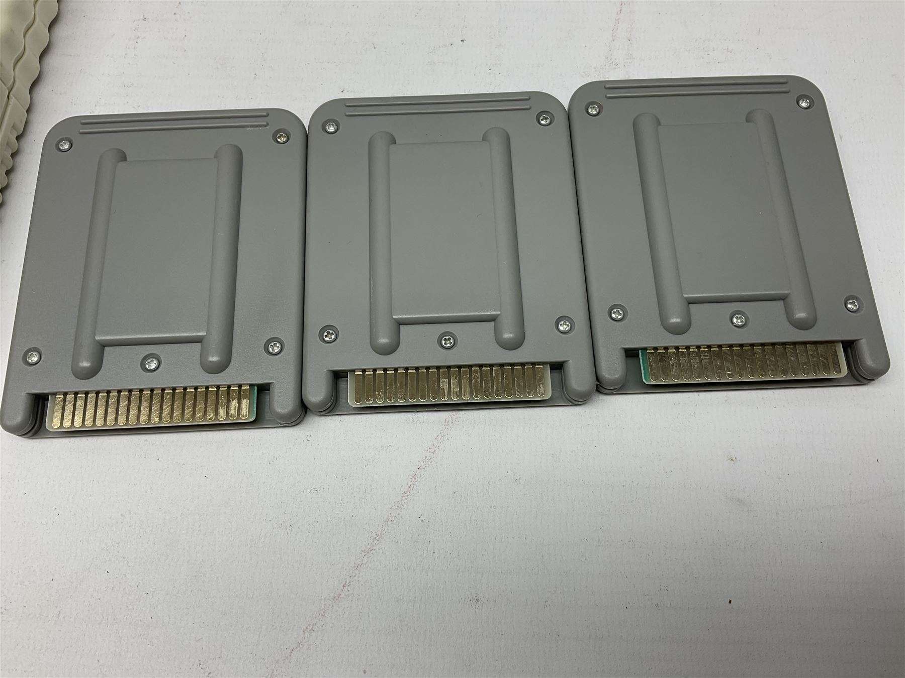 Collection of retro handheld games, including Nintendo Game & Watch ‘Snoopy Tennis’ (1982) and ‘Squish’ (1986) both with instruction booklets, Casio CG-600 ‘Star Invader’ with box, 3 in 1 LCD cartridge game including ‘Soccer’, ‘Invader’ and ‘Bomb Finder’ games, and two Grandstand ‘Pinball Wizard’ (1988) games, both with original boxes