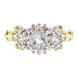9ct gold aquamarine and diamond cluster ring, three round cut aquamarines, with diamond chip surround and scroll design shoulders, hallmarked