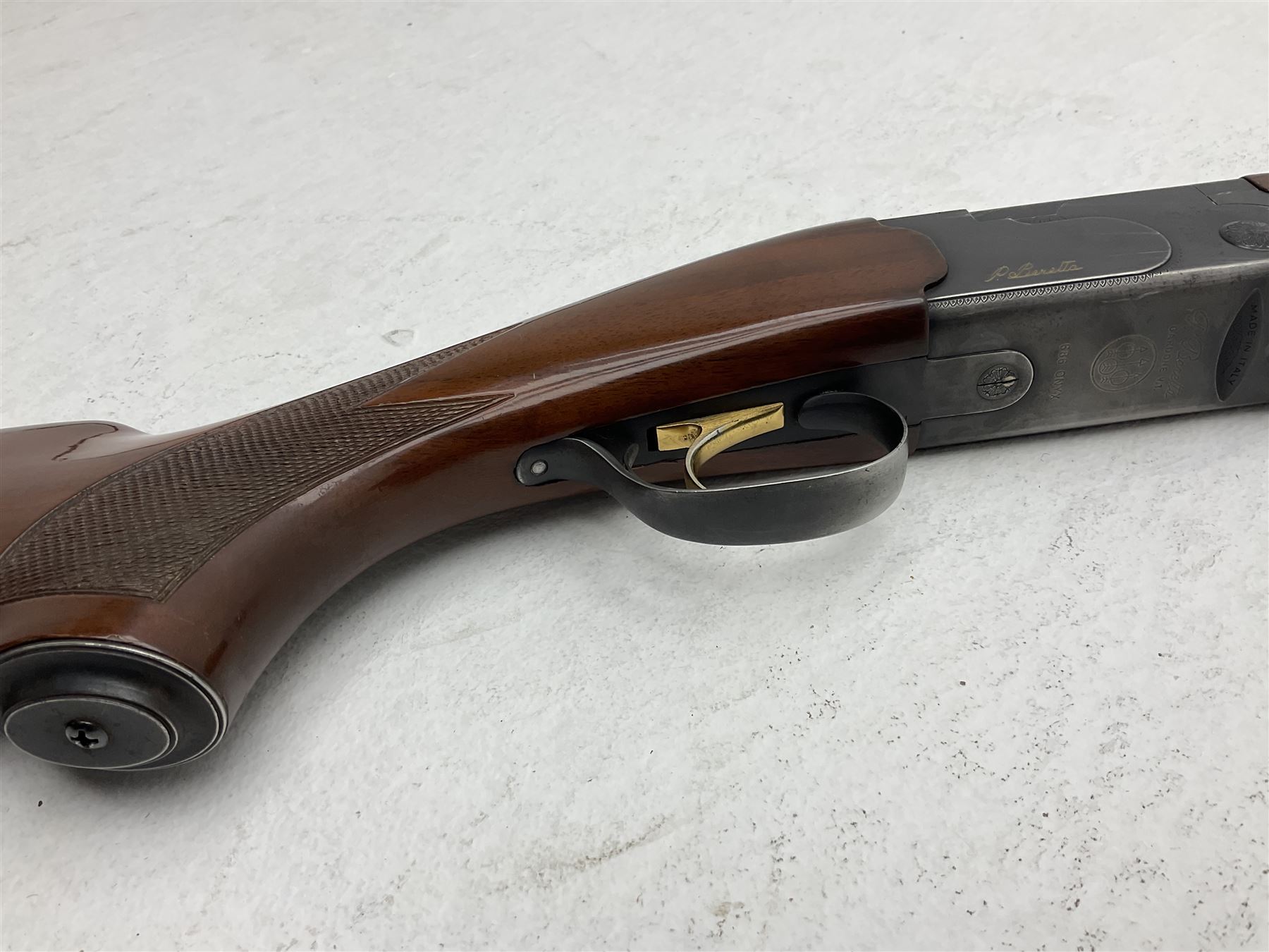 Italian Beretta Model 686 Onyx 12-bore double barrel over-and-under boxlock ejector shotgun, the 74.5cm barrels with ventilated top rib, walnut stock with chequered pistol grip and fore-end, single selective trigger Fore-end no.38044 Barrels no.5314 Action no.F38044B; together with set of five chokes (two fitted) SHOTGUN CERTIFICATE REQUIRED