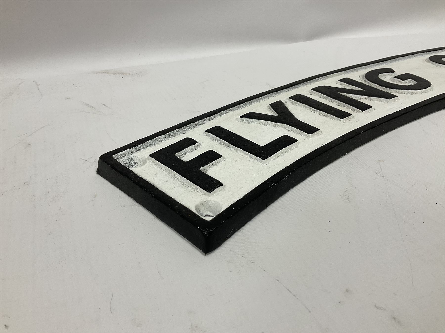 Cast iron Flying Scotsman arched railway sign, L89cm