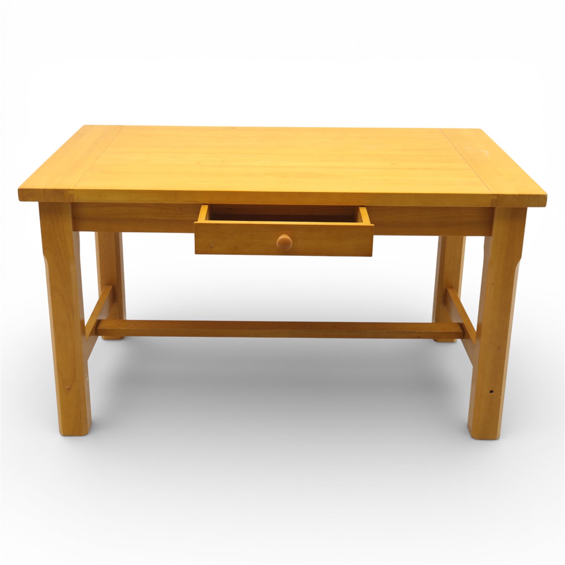 Solid oak dining table and set of seven pine farmhouse chairs including two carvers, rectangular top with tongue and groove style finish, supported a 'H' stretcher with square chamfered legs, pine farmhouse chairs with central splat and turned legs