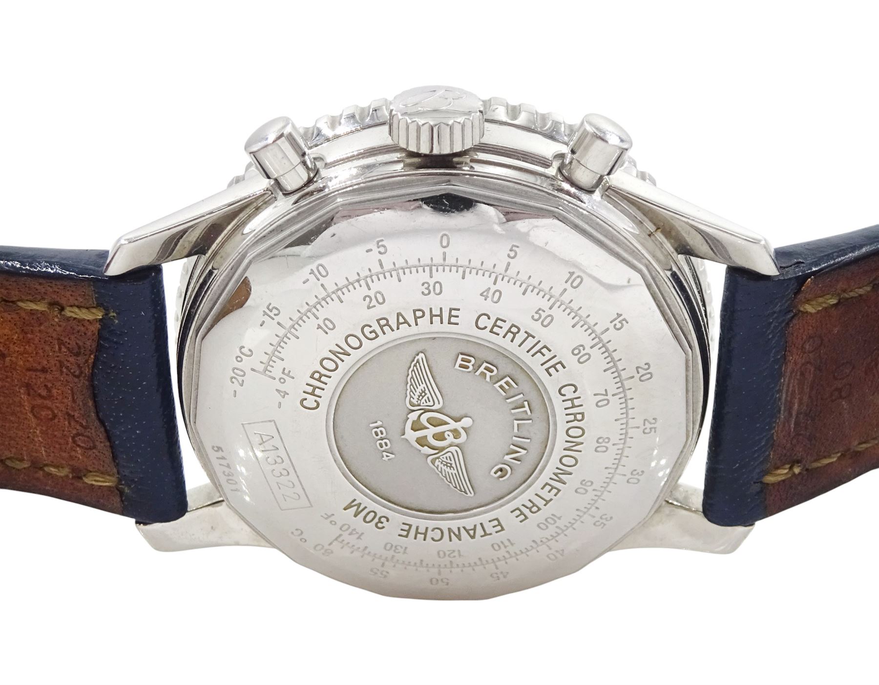 Breitling Old Navitimer gentleman's stainless steel automatic wristwatch, Ref. A13322 serial No. 517301, blue dial with date aperture,  silvered subsidiary dials at 6, 9 and 12 for seconds, 30 minute and 12 hour recording, bi-directional inner slide rule scale, on blue leather strap, boxed with papers and receipt dated 2002