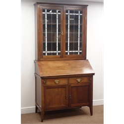  Late 19th century mahogany bureau bookcase, lead glazed doors enclosing two shelves, fall front with fitted interior above two drawers and double cupboards, W103cm, H213cm, D57cm  