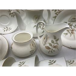 Royal Doulton yorkshire rose tea and dinner service, comprising teapot, milk jug, sucrier, eight tea cups and saucers, nine dinner plates, eight side plates, eight dessert plates, eight bowls, gravy boat and plate