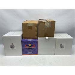 Six Disney Winnie The Pooh snow globes, to include four Halloween examples, including Tigger's Haunted House, together with Winnie The Pooh Gazebo snow globe and Bonfire snow globe, all with boxes