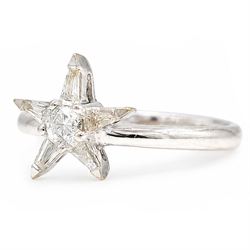 18ct white gold diamond star cluster ring, single round brilliant cut diamond, surrounded by five tapered baguette cut diamonds, stamped 750