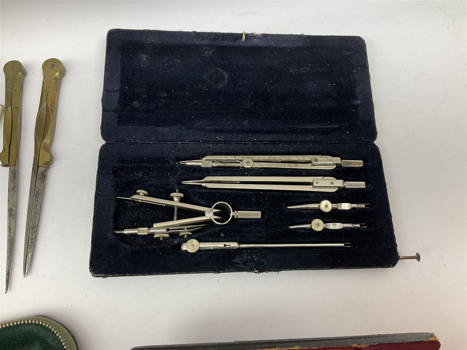 Negretti & Zambra drawing instrument set, the ruler with manuscript name 'F/Sgt. F. Hamilton R.A.F. 194(?)', cased; four other drawing instrument sets by Anker-Precision Germany, EcoBra, Temple etc, all cased; and quantity of loose drawing instruments