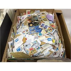 Mixed stamps, mostly loose on pieces, used World stamp sheets etc, in three boxes