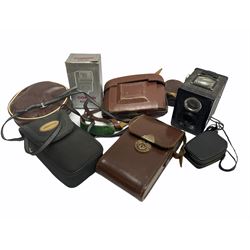 Vintage cameras and equipment, including Kodak junior 620, in case, Agfa Isolette II, in case, Pentax zoom 105, etc  