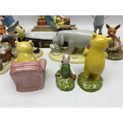 Nine Royal Doulton Winnie the Pooh Collection figures, including Oh Dear Bath Time's Here, Going Sledging, Tigger's Splash Time and Christopher Robin, together with a Royal Doulton Disney Showcase Jiminy Cricket figure, all boxed