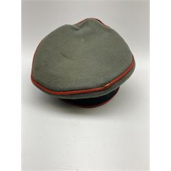 WW2 German Army Artillery officer's peaked cap, red piping to the crown and bordering the central band, zinc eagle and aluminium cockade insignia, officer's bullion chin cords, interior retains original sweatband and lining has tailor's celluloid diamond with 'Extra Klasse' logo and 'Marke Standard'
