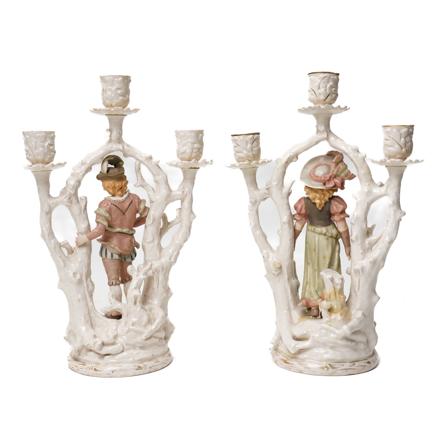 Alfred Stellmacher - Pair of three branch candelabra of naturalistic form, each with a central standing figure on circular bases with gilt highlights H37cm