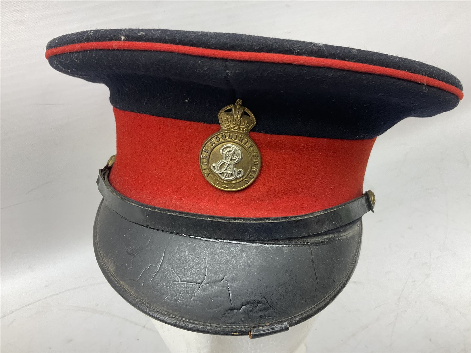 Royal Military College Sandhurst parade uniform with peaked cap and two-piece mess dress, all bearing historic manuscript labels for J.E.A. Baldwin, possibly Air Marshal Sir John Eustace Arthur Baldwin (1892-1975) who served in the British Army 1910-18 & 1944-58 and in the RAF 1918-44.