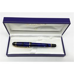A Waterman Phileas fountain pen, with blue marbled effect body and gold coloured clip and banding, with makers fitted blue leather box, and outer card sleeve. 