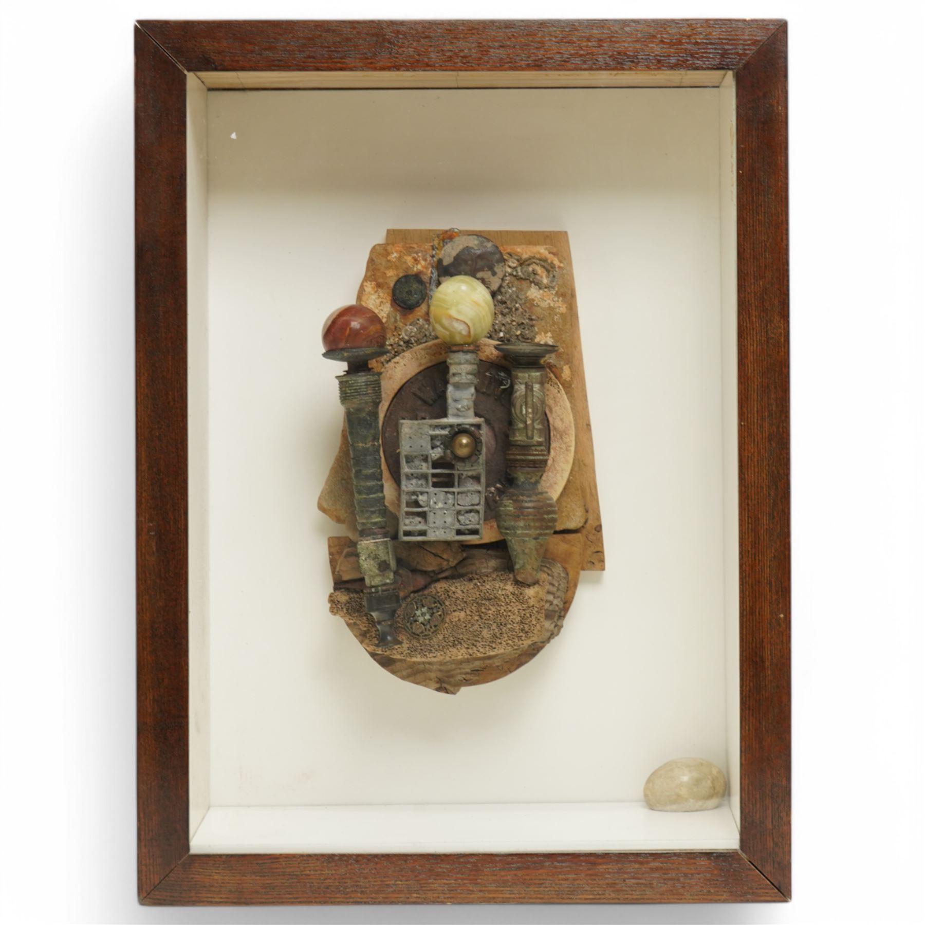 Andrew Coates (British 1939-): 'The Guardians', assemblage in wood, found objects and with three marble eggs, titled and dated 1999 verso, in case, overall 50cm x 37cm