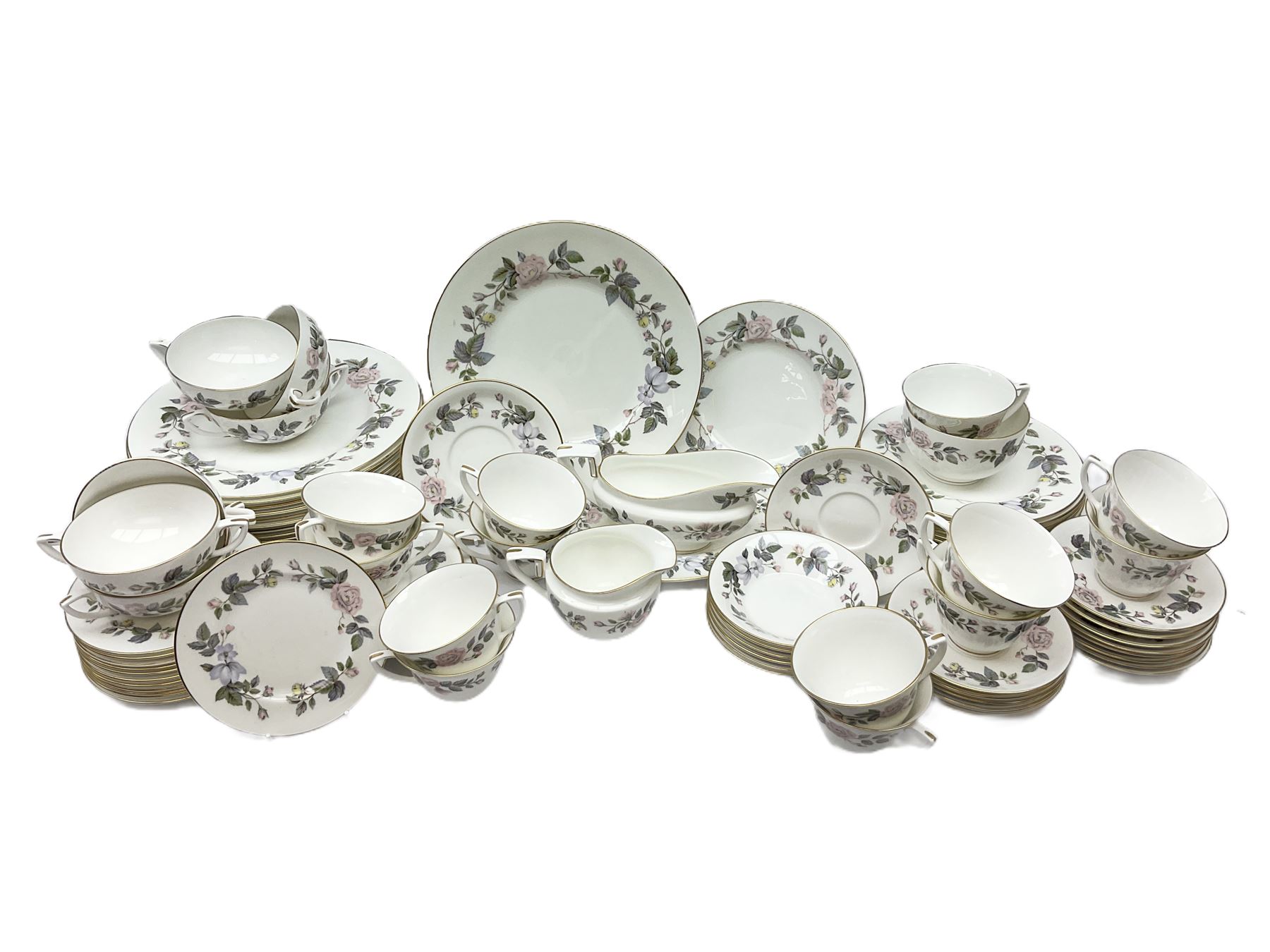 Royal Worcester June Garland pattern tea and dinner wares, comprising thirteen dinner plates, twelve dessert plates, twelve side plates, six twin handled soup bowls and six saucers, six small bowls, sauce boat and stand, thirteen teacups and fifteen saucers, open sucrier, and milk jug