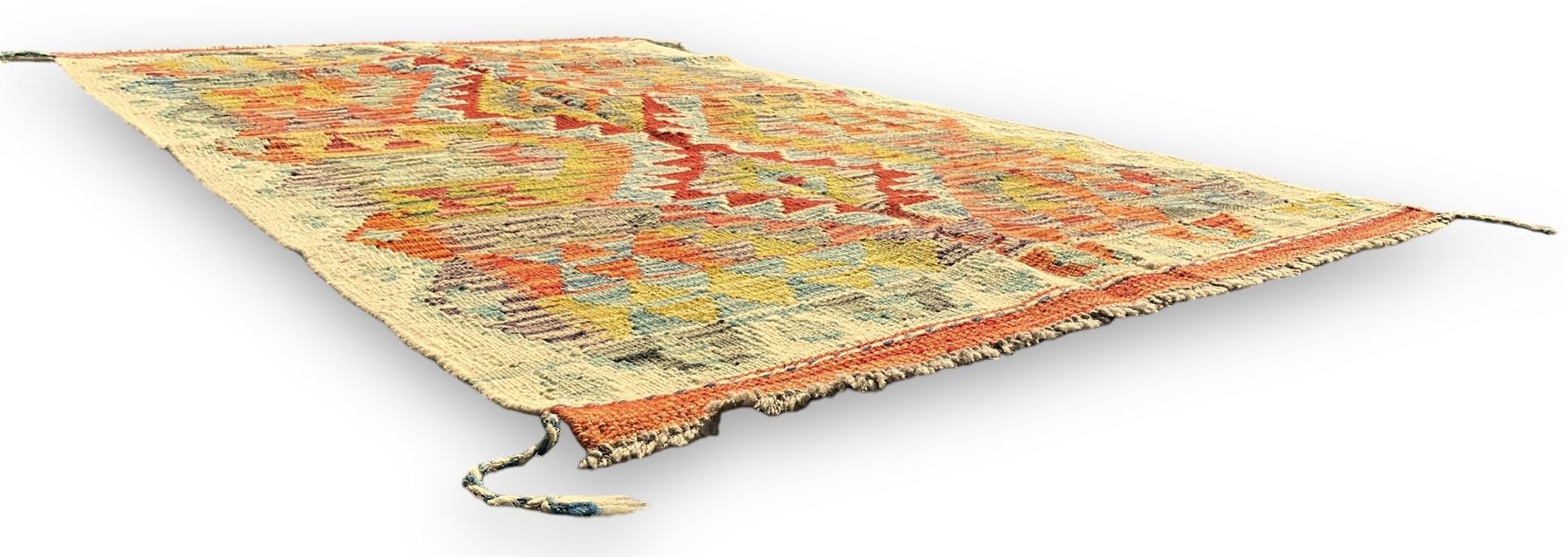 Afghan Chobi Kilim ivory ground rug, central geometric design consisting of stacked lozenge medallions in shades of red, green, and blue, flanked by multicoloured triangular motifs, guarded by zigzag patterns in contrasting tones