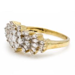 Iliana 18ct gold diamond Ballerina ring, nine round brilliant cut marquise set diamonds, with three rows of tapered baguette cut diamonds set either side, stamped, total diamond weight 1.00 carat