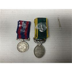 George V Military Medal and Distinguished Conduct Medal miniature group of seven medals comprising MM, DCM, WW1 trio including 1914 Star with date clasp and MID leaves, The Great Durbar Delhi 1911 Medal and LSGC; on pinned wearing bar; WW1 Military Medal miniature group of three comprising MM, BWM and Victory; Victoria North West Canada 1885 miniature; and George VI miniature Territorial Efficiency medal; all with ribbons