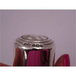 Four silver mounted glass scent bottles, including a Victorian cut glass example with embossed silver cover, and three cylindrical plain glass examples, on with engine turned decoration, three with glass stoppers, together with a pair of silver salts and spoons, all hallmarked, tallest H8cm