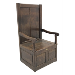 18th century oak box seat settle, panelled back, cresting rail initialled 'T.I', the moulded seat with hinged lid, down swept arms on octagonal faceted supports, fielded panelled base, engraved brass escutcheon initialled again 'T.I', W80cm, H149cm, D59cm