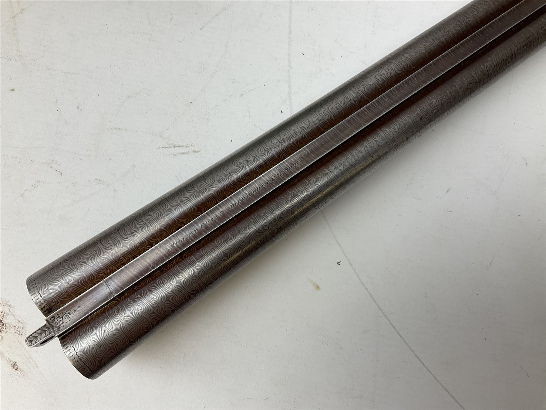 Midland Gun Company Birmingham & London 12-bore side-by-side box-lock non-ejector double barrel shotgun with 76cm damascus barrels, Prince of Wales style walnut stock with chequered grip and fore-end, top safety and engraved lock no.62160 L120cm overall; in scratch built baize lined wooden case. SHOTGUN CERTIFICATE REQUIRED.