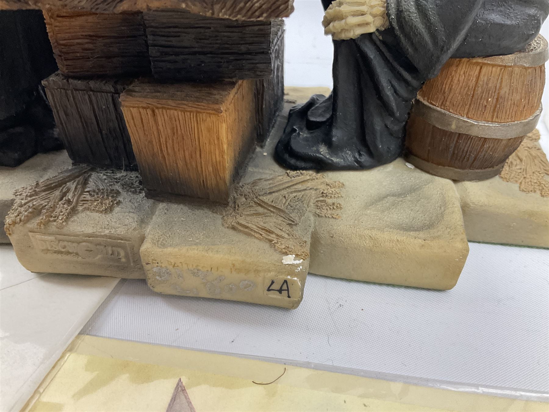 Terry Pratchett Discworld figures, designed by Clarecraft, comprising Death and Granny Weatherwax, DW90, Deathhead DWE8, Dried-frog pill box, boxed, DW63, Death as Beau Nidle, boxed, DW88, Agnes Nitt DW68, Detritus, DW22, Bonsai mountain, DW78, Volcanic bonsai mountain, boxed, DW79, Bonsai mountain valley, DW80, together with the Discworld mapp, and a collection of Terry Pratchett cards.  