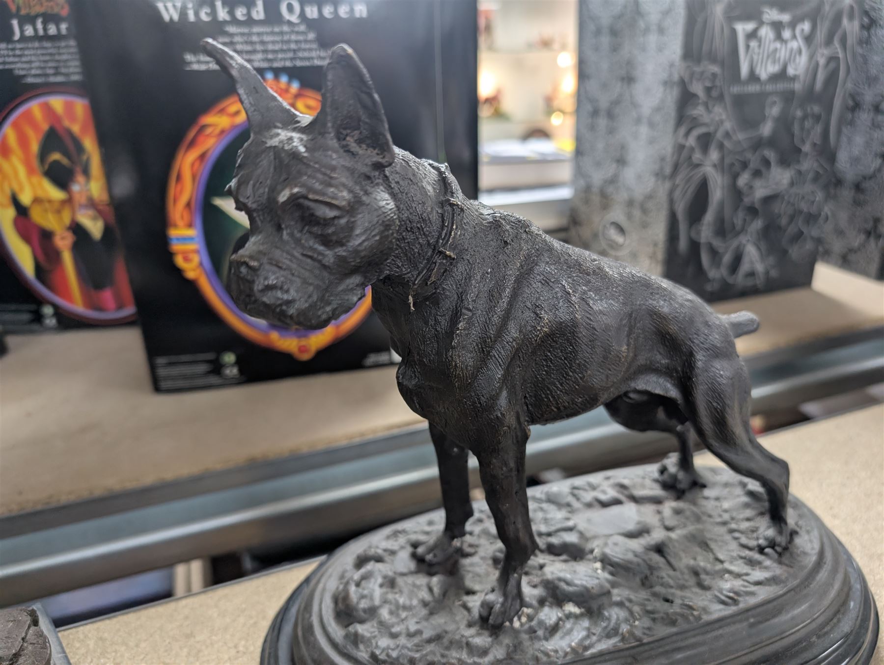 Two spelter dog figures, each upon hardstone bases, tallest H33cm