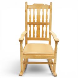 Beaverman - oak 'Ripley' rocking chair with shaped lathe backs and leather seat, with signature Beaver carving to the top rail, flanked by Yorkshire Roses, by Colin Almack of Sutton near Thirsk