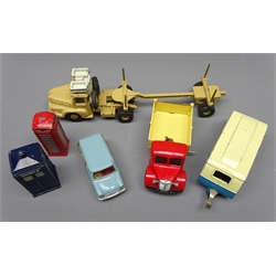  Six Dinky die-cast models: Streamline Caravan No.190, French made Pipeline Transporter No.39/893 (lacking pipes), restored Bedford End Tipper Truck with red cab and cream back No.410, Austin Seven Countryman No.199, Telephone Box N0.750 and Police Box N0.751, all unboxed (6)  