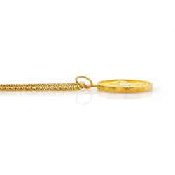 21ct gold Taurus pendant, stamped 875, on 18ct gold popcorn link chain necklace, stamped 750